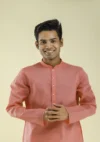 Nawab Parker Buy Comfortable Coral Pink Kurta Pajama for Men half front view
